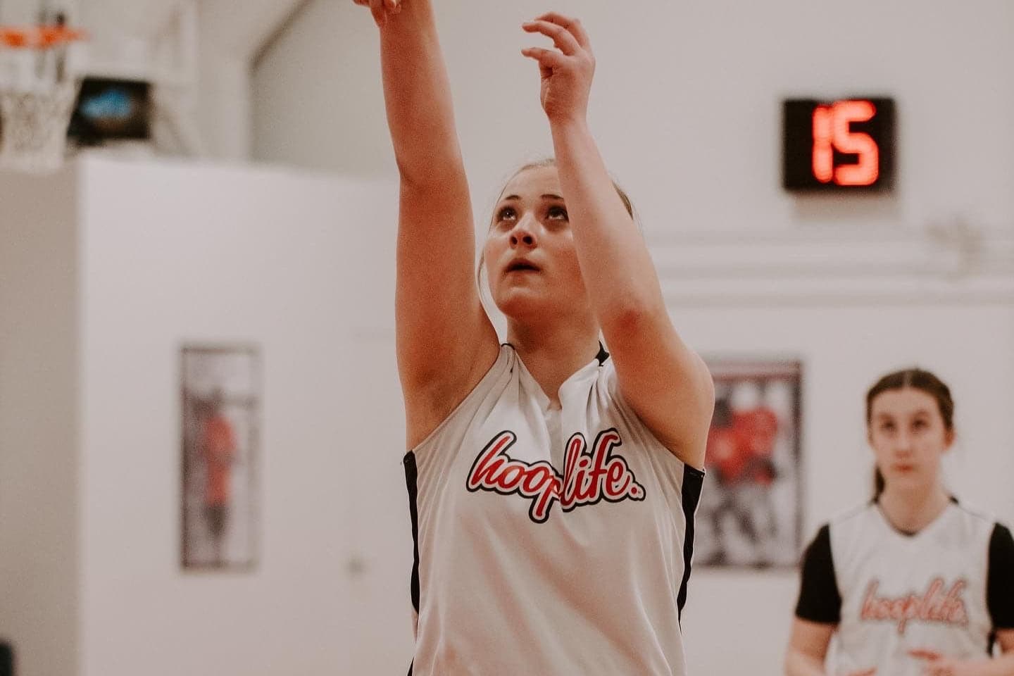 A HoopLife player following through on her shooting form in Regina