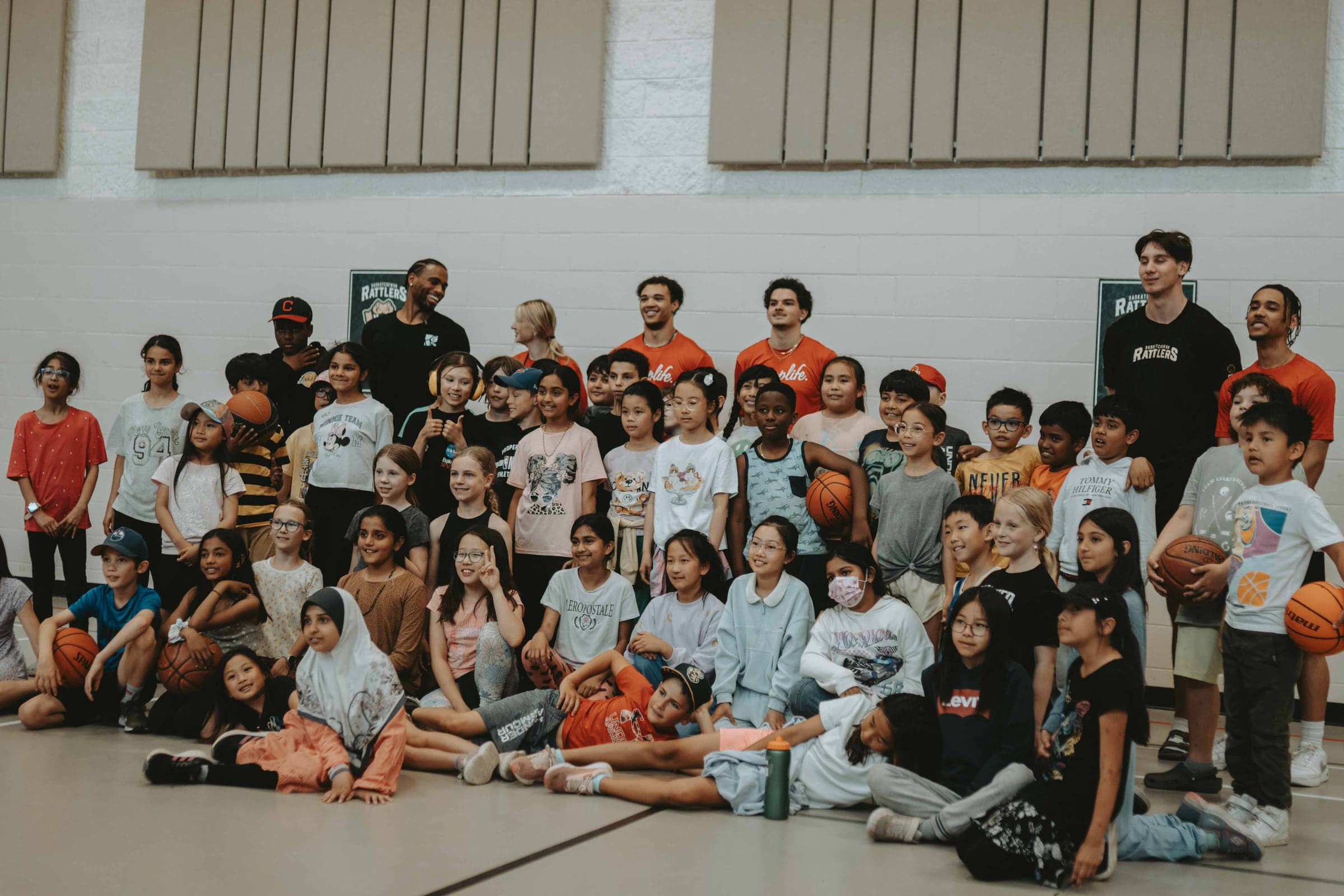 A community gym full of young people at a HoopLife clinic
