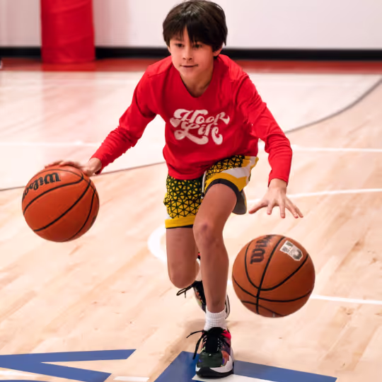 Young athletes in a basketball training session