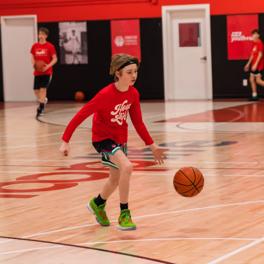 Athlete dribbling a ball