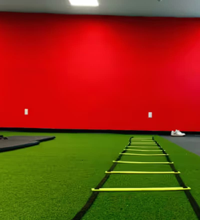 The turf training room with an agility ladder laid out