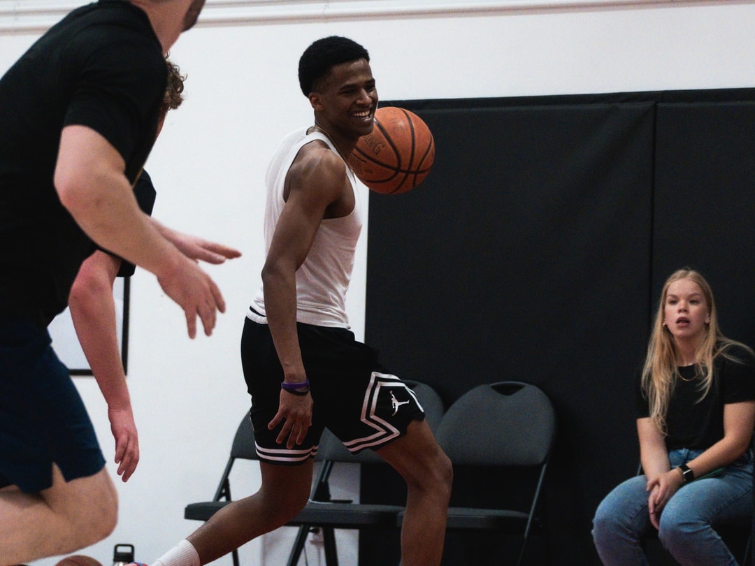 An adult league player rising for a jump shot