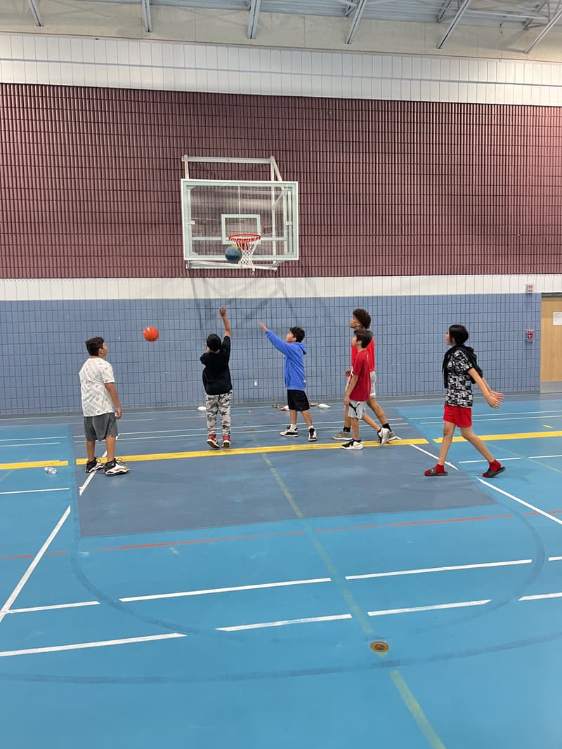 Players working through a shooting drill at the Kawacatoose clinic
