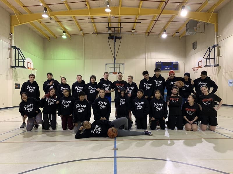 The White Bear team gathered at centre court with their HoopLife coaches