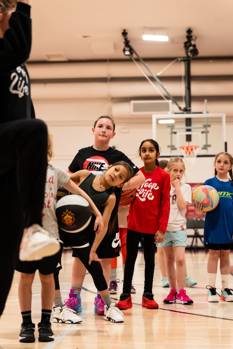 Friends together on the court at the HoopLife Centre