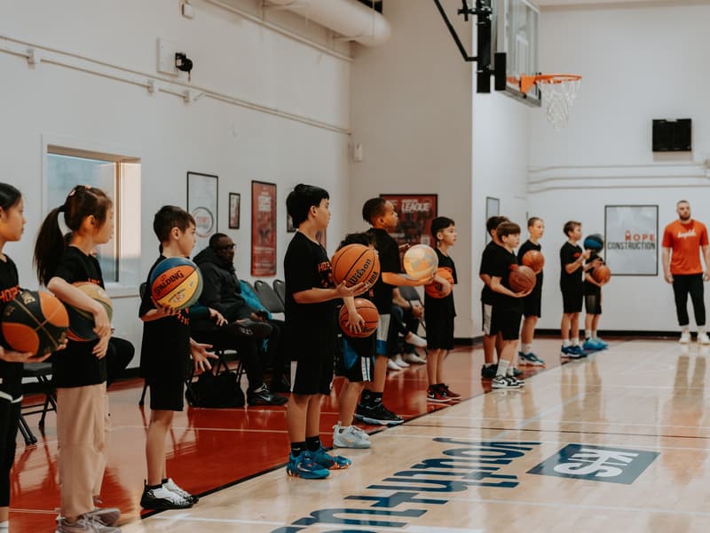 Players working through a ball-handling line at a HoopLife session