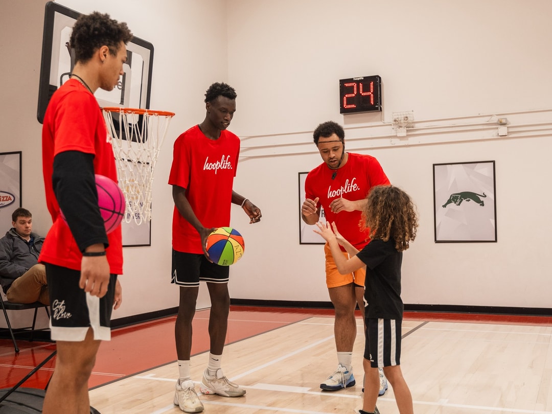 Three HoopLife coaches working a Young Stars class