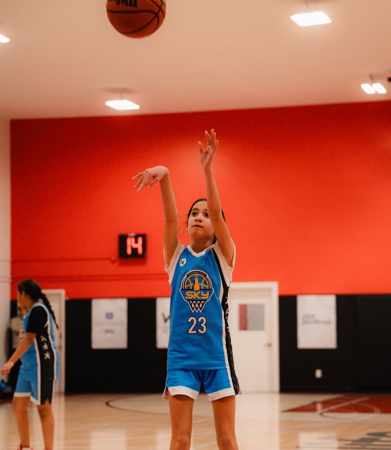 A member rising for a jumper at open gym