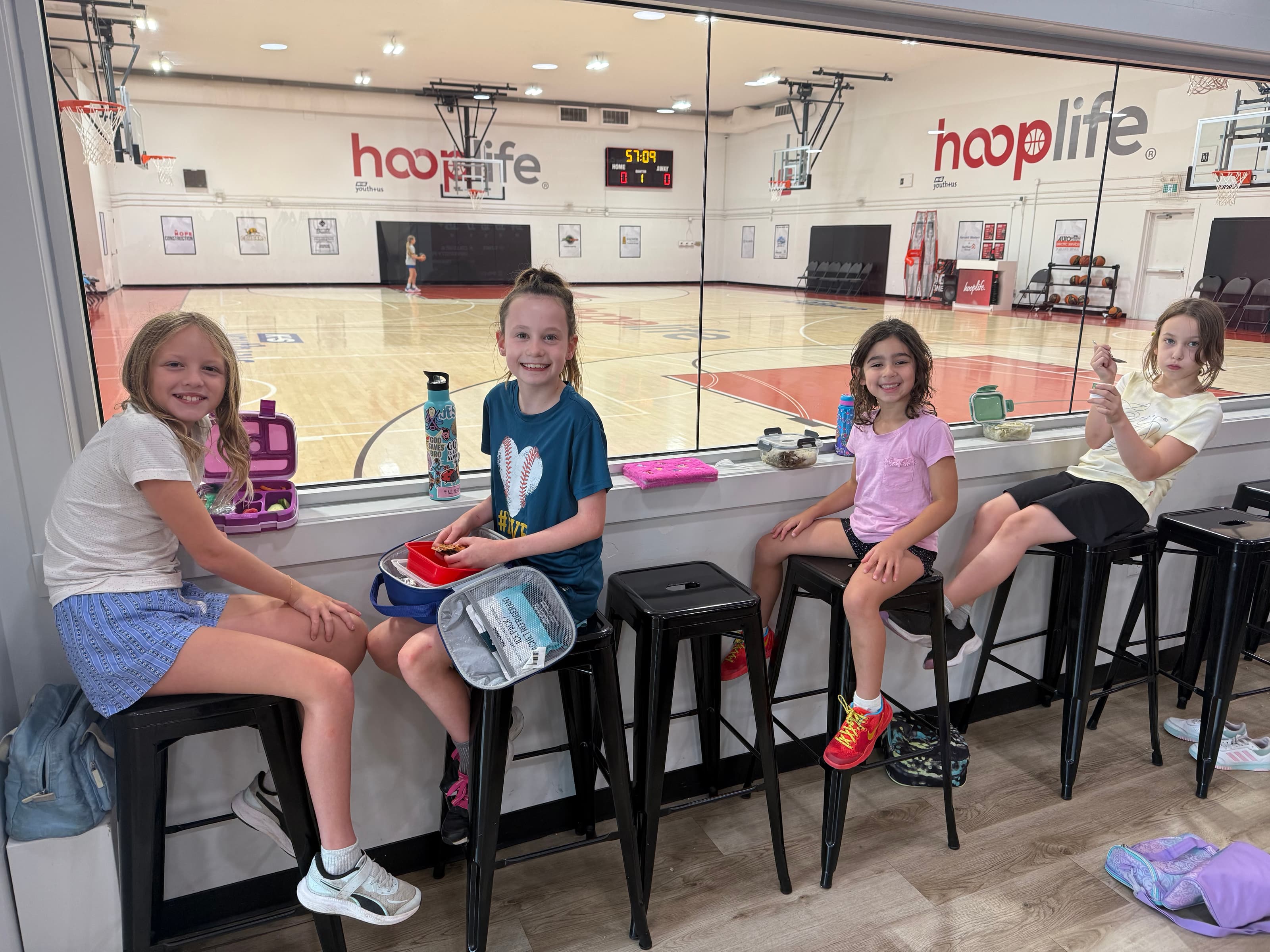 Girls working on basketball drills during the HoopLife and Unshakeable Sports Ministry summer camp at the HoopLife Centre in Regina